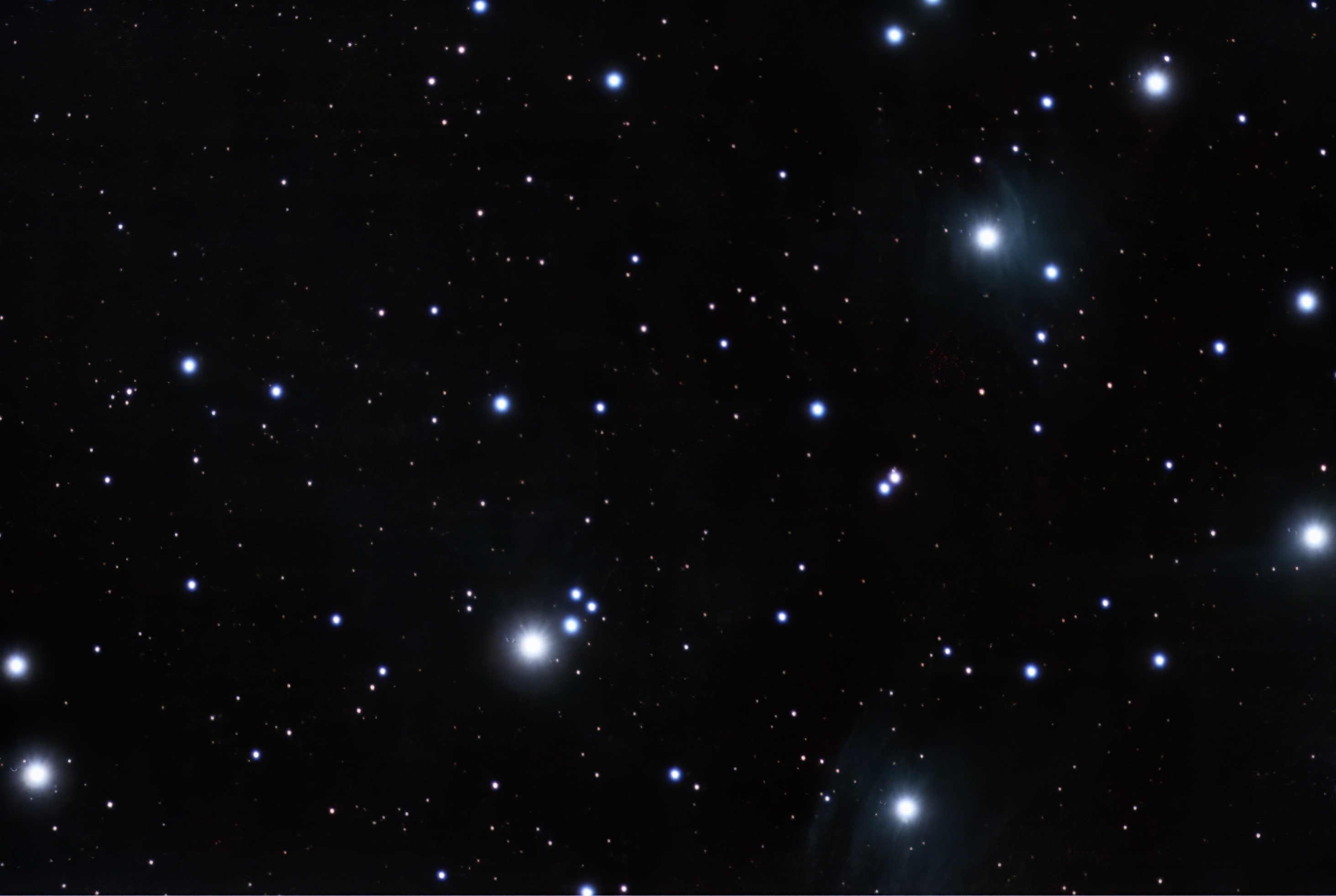 Figure 10: Live stacked image of Pleiades (M45) captured with a Stellina automated station: with little noise and stars with a punctual appearance. The ResNet50 IQA model rating is 7.1 .