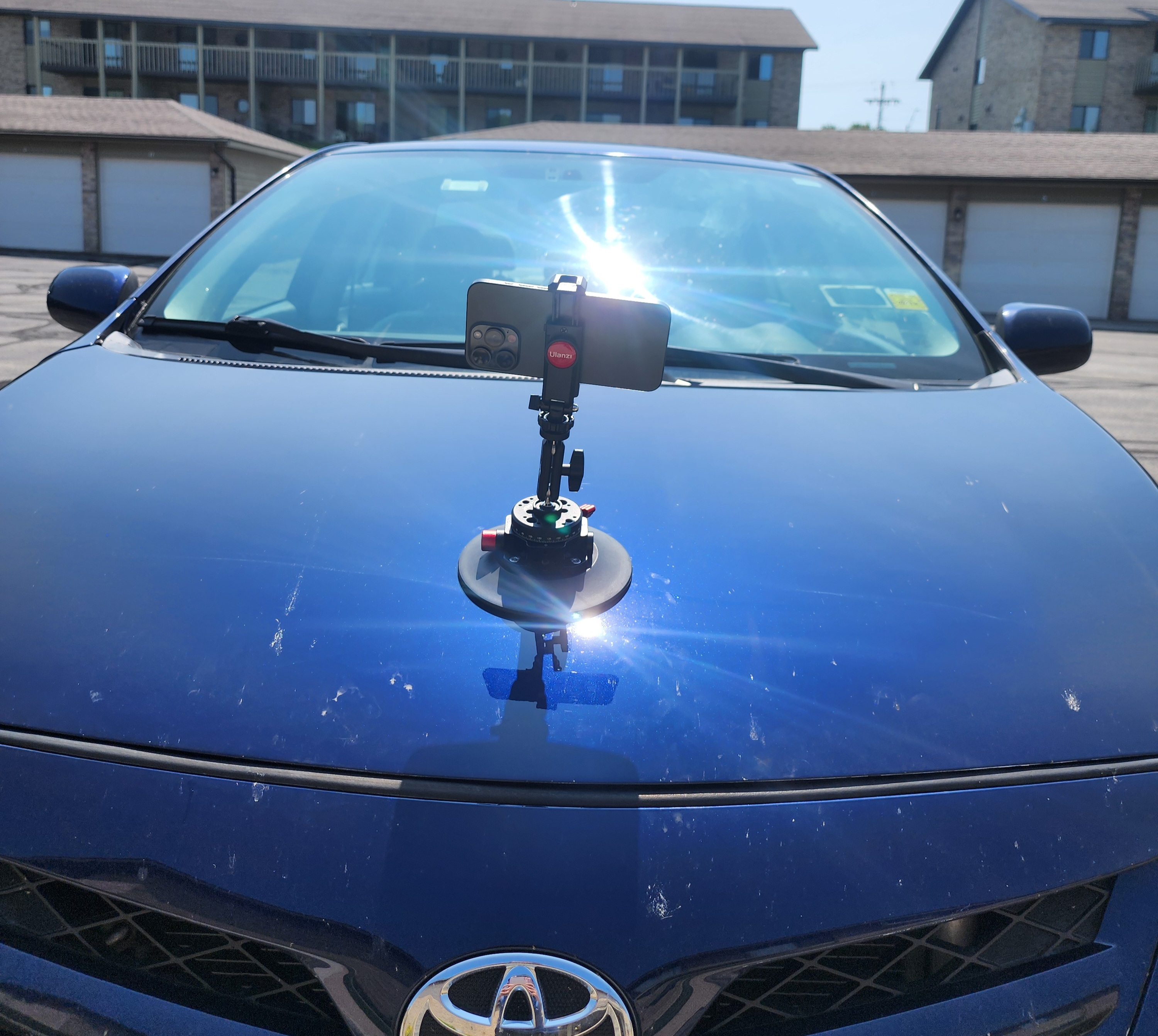 Figure 1: Vehicle-mounted smartphone used to collect field pavement imagery for UWGB-StreetCrack.