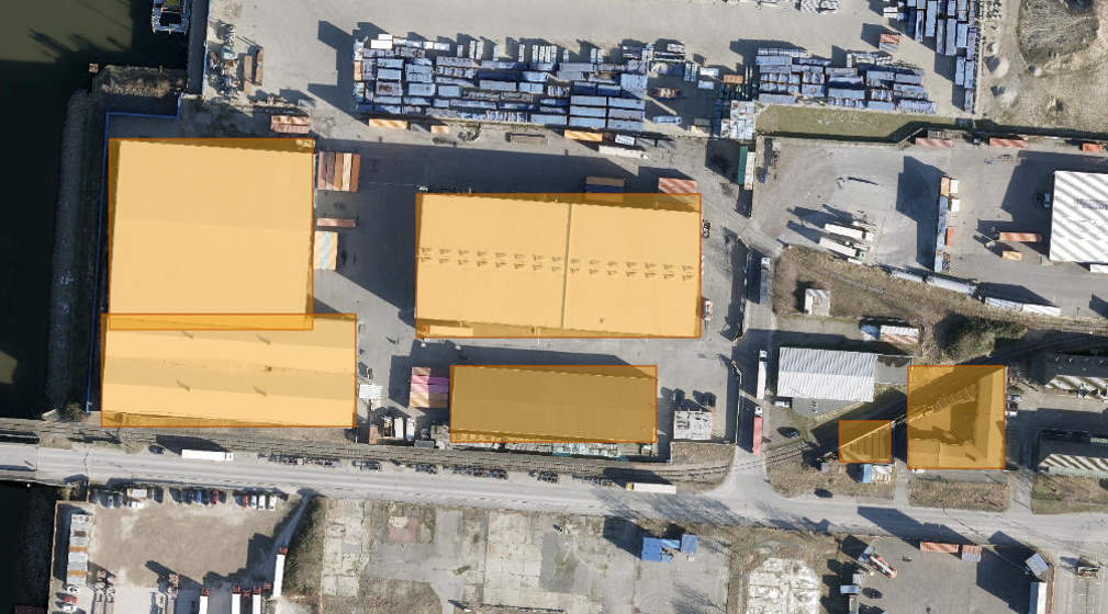 Figure 9: Visualization of enriched metal roof material attributes overlaid on the Esri World Imagery basemap and queried from pykciusing LLM.