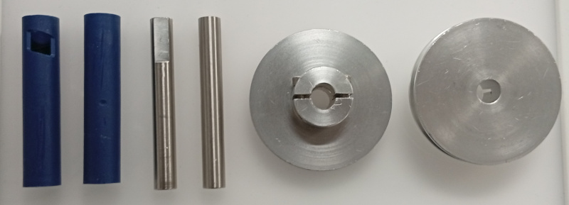 Figure 5: The objects used in the experiments shown from both sides. For the Novo object (left) the square recess is used to obtain both reflection and revolution. For WRS-08 (middle) the reflection and revolution is found by the flat surface. For WRS-11 (right) the reflection is found by the presence or lack of the clamp, but the revolution can only be determined from the clamp.